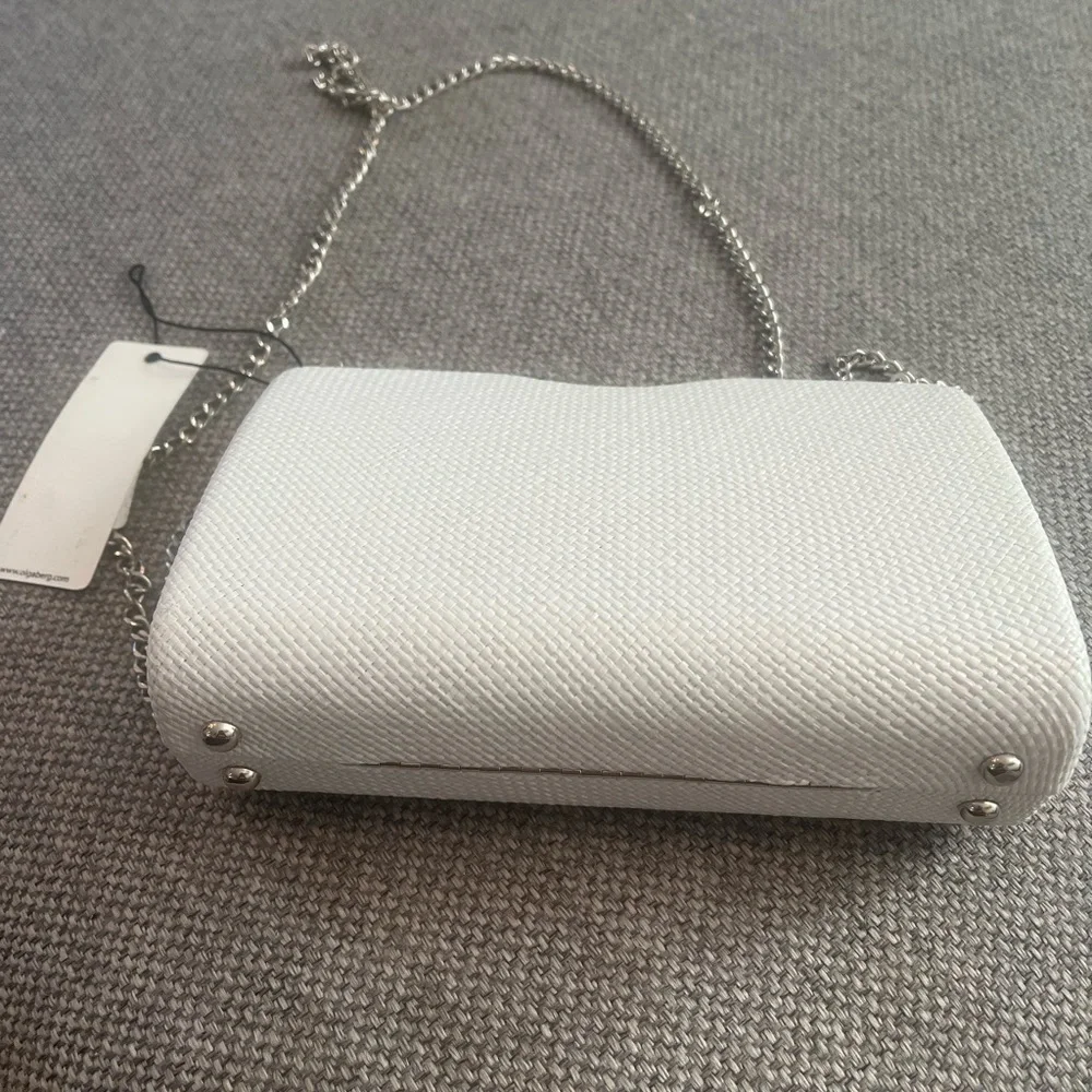 Olga Berg Cece‎ Straw Woven Box Clutch with flaw